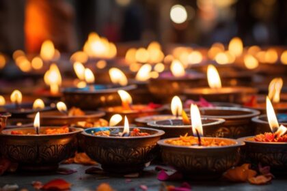 warm glow from numerous diwali diyas casts soft light celebrating festival lights - The Fourth